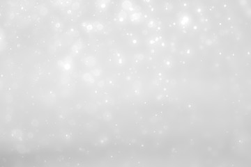 White and Silver lights on bokeh abstract background.