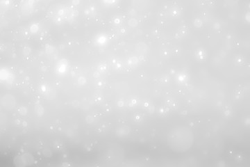 White and Silver lights on bokeh abstract background.