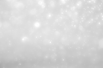 White and Silver lights on bokeh abstract background.