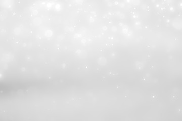 White and Silver lights on bokeh abstract background.