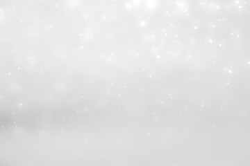 White and Silver lights on bokeh abstract background.