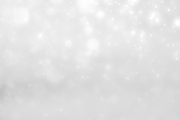 White and Silver lights on bokeh abstract background.