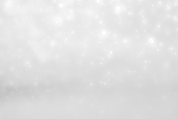 White and Silver lights on bokeh abstract background.