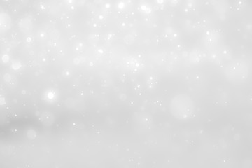 White and Silver lights on bokeh abstract background.
