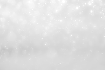 White and Silver lights on bokeh abstract background.