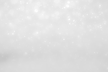 White and Silver lights on bokeh abstract background.