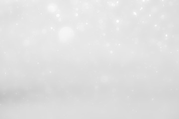 White and Silver lights on bokeh abstract background.