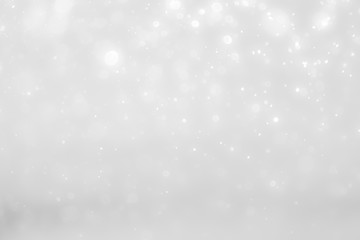 White and Silver lights on bokeh abstract background.