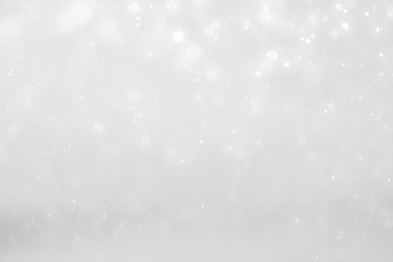 White and Silver lights on bokeh abstract background.