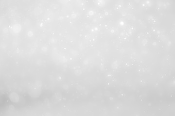 White and Silver lights on bokeh abstract background.