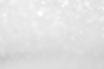 White and Silver lights on bokeh abstract background.