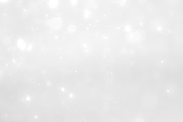 White and Silver lights on bokeh abstract background.