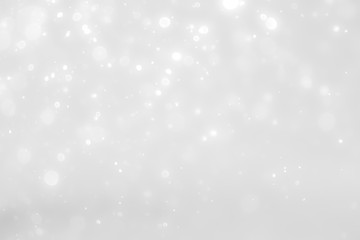 White and Silver lights on bokeh abstract background.