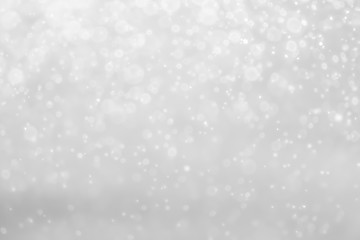 White and Silver lights on bokeh abstract background.