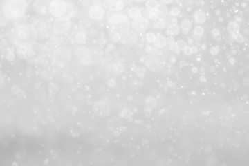 White and Silver lights on bokeh abstract background.