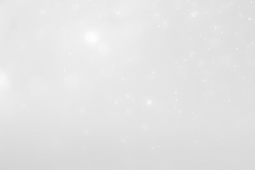 White and Silver lights on bokeh abstract background.