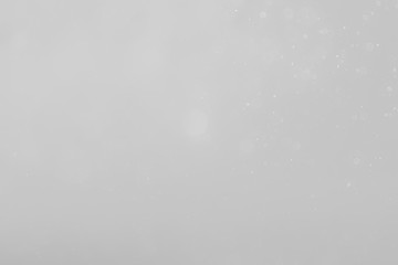 White and Silver lights on bokeh abstract background.