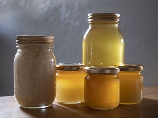 Jars of different honey varieties