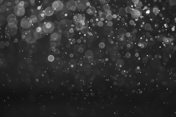 White and Silver lights on bokeh abstract background.