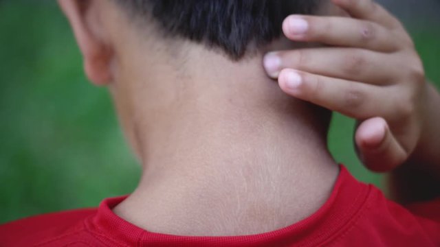 Back of a kid's neck feeling pain while using cellphone