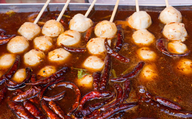 Grilled pork meat ball with spicy chillies sauce,appetizer street food at Thailand