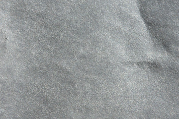 Macro image of gray newsprint