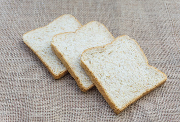 Group bread whole wheat sliced vintage background.Healthy food concept,high fiber