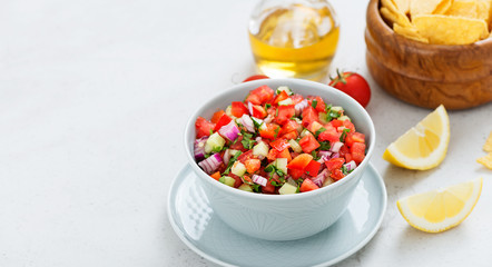Homemade pico de gallo with tomatoes, peppers, jalapenos and red onions.