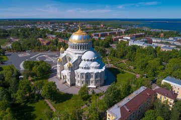Fototapeta na wymiar The old St. Nicholas Naval Cathedral on a sunny June day (aerial photography). Kronstadt, Russia