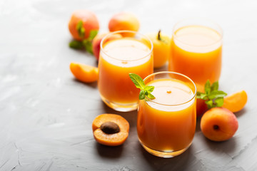 Fresh apricot juice on the marble table