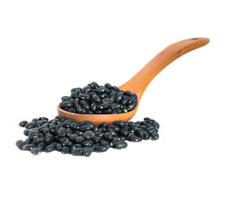 black beans with wooden spoon on white background
