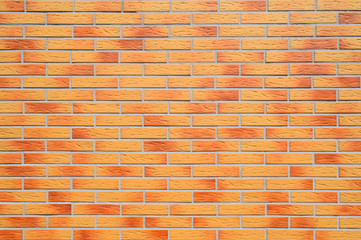 Brick wall background. Clean red and orange brickwork copy space wall grunge vintage texture. 