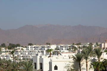beautiful view of the city with desert mountains