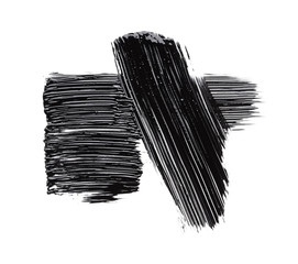 Black strokes and texture mascara or acrylic on a white background