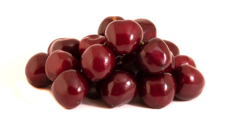 many cherry on a white background close-up
