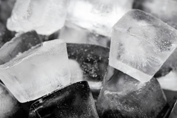 Ice cubes on a black background.