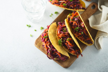 Obraz na płótnie Canvas Tacos with red cabbage salad