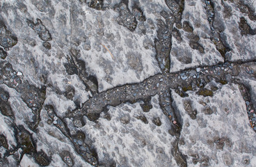 Natural background. The texture of the stone. Old Weathered Marble