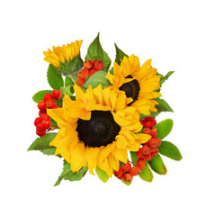 Decorative sunflowers and rowan berries in a beautiful autumn arrangement