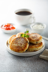 Homemade cottage cheese pancakes on white plate