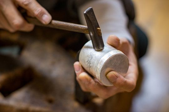 Craftsperson's Hand with a Hammer / Crafting