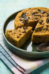 Handvo/handwa is a vegetable cake originating from the Gujarat, India. selective focus