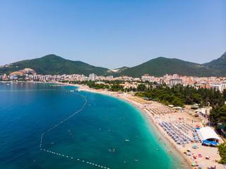 Obraz premium Aerial view of long coastline of Budva city, Montenegro. Balkans, Adriatic sea, Europe