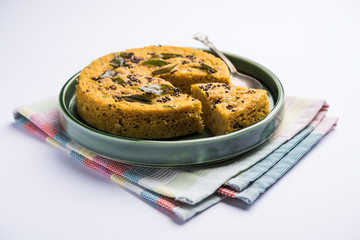 Handvo/handwa is a vegetable cake originating from the Gujarat, India. selective focus