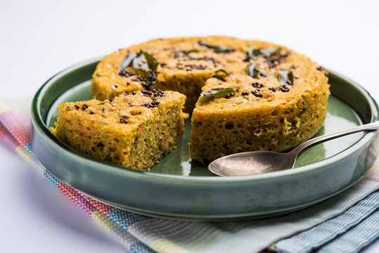 Handvo/handwa is a vegetable cake originating from the Gujarat, India. selective focus