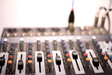 Close-up of modern digital sound mixer in a sound recording studio