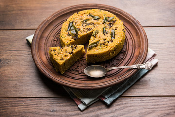 Handvo/handwa is a vegetable cake originating from the Gujarat, India. selective focus