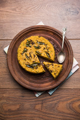 Handvo/handwa is a vegetable cake originating from the Gujarat, India. selective focus