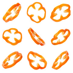 Set of flying cut fresh bell pepper on white background