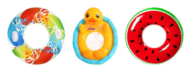 Set of bright inflatable rings on white background